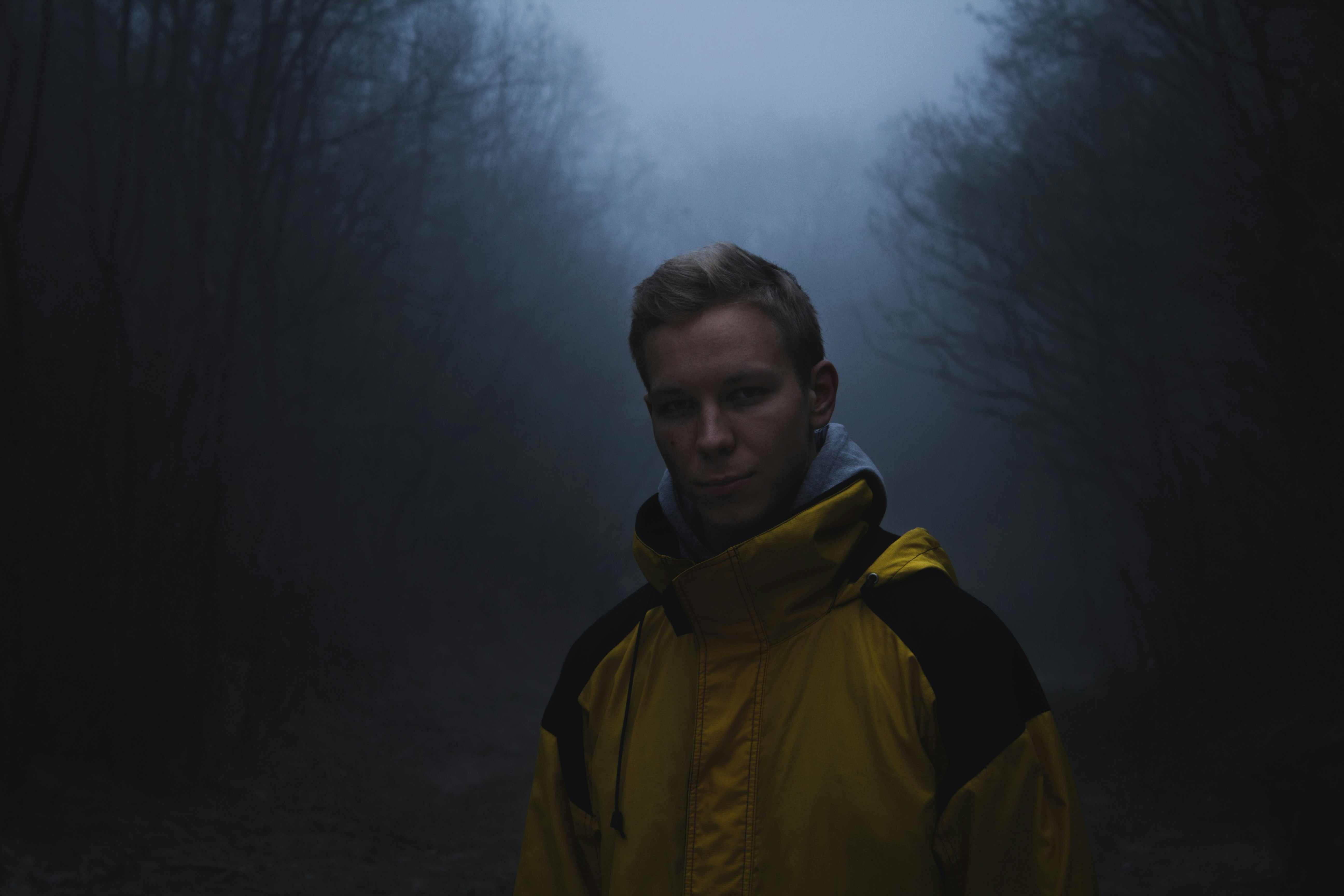 man in yellow and black jacket